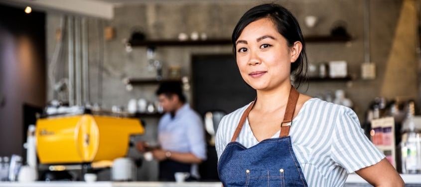 woman working in cafe