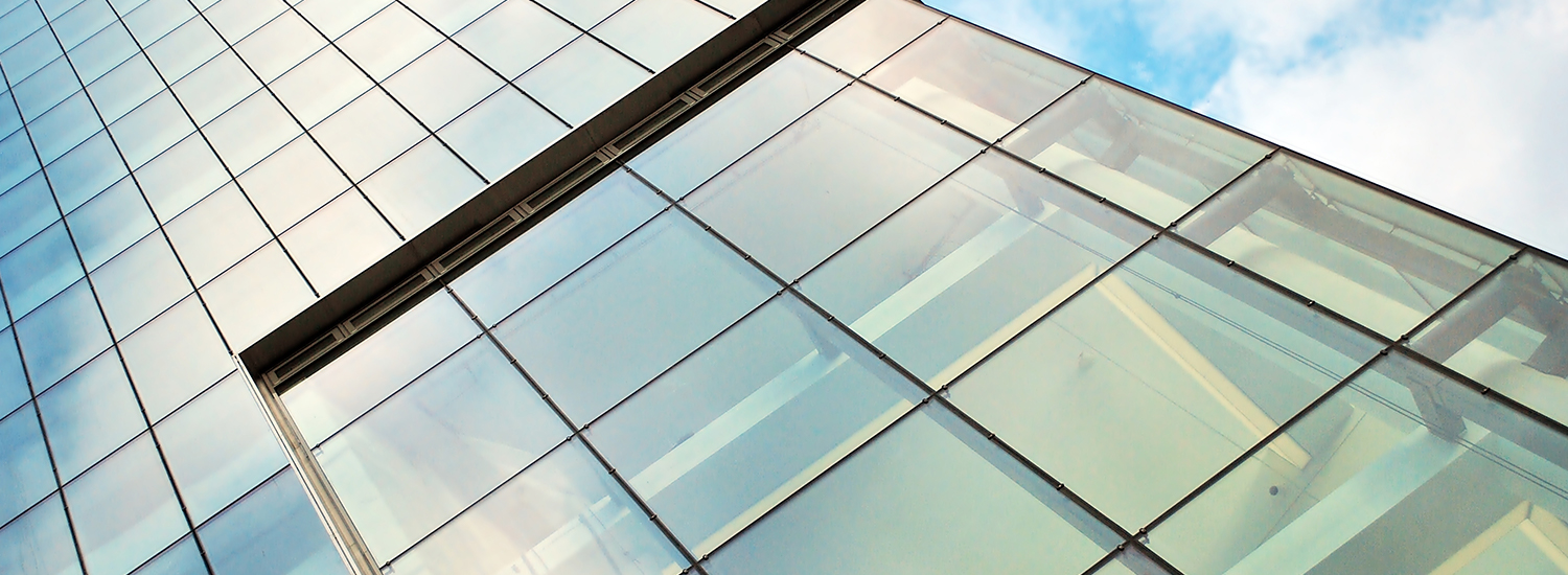 Skyscraper with glass facade. Modern building.