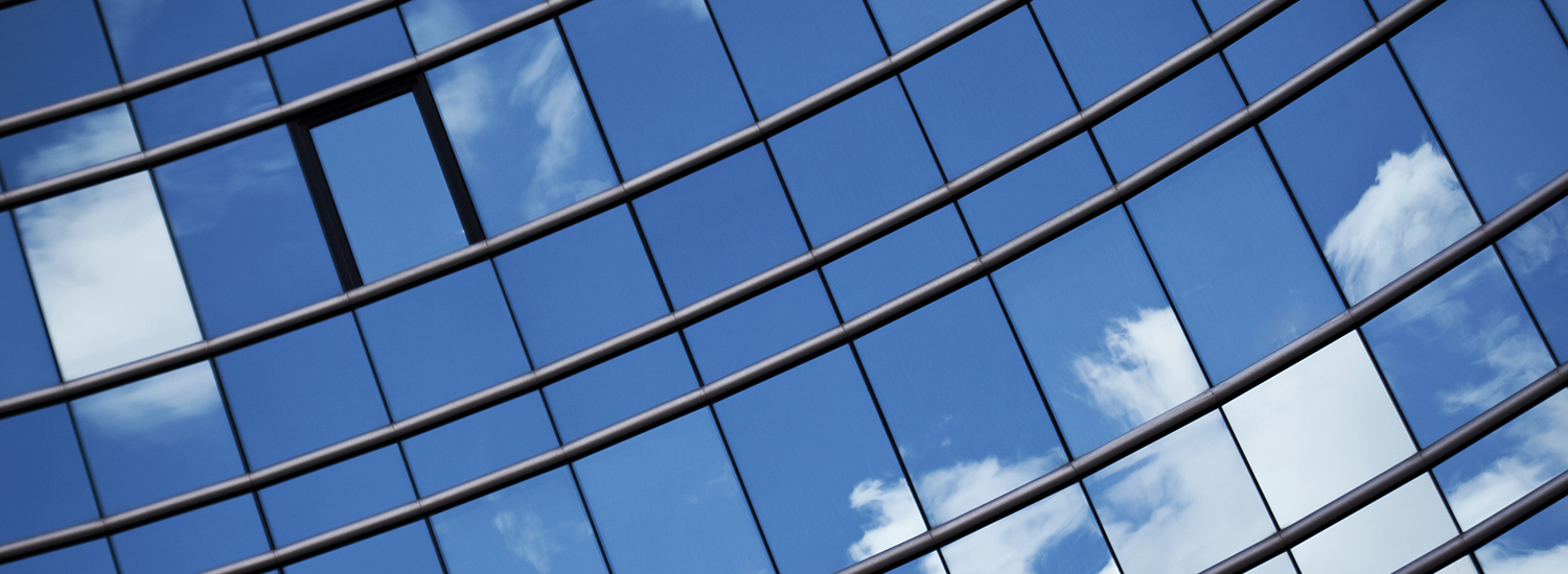 Glass facade of a modern office building in the city